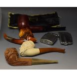 A carved meerschaum pipe, the bowl as a bust of a lady, silver collar,