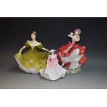 A Royal Doulton figure, Cheryl, HN3253; another, Lynnem HN2329; a Coalport figure,