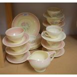 Susie Cooper Teaware - pastel floral plattern on cream ground ; two small cups and saucers;