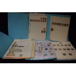 ** stamp / stamps - four blue paper folders with interesting items including older from Austria,