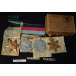 A set of four WWII medals, Italy Star, defense medal, 1939-1945 Star; etc with ribbons,