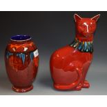 Poole Pottery - a red glazed cat, turquoise and orange drip glazed neck decoration,