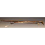 An Edwardian walking stick, bamboo shaft, gold plated mount, horn handle; a similar riding crop,