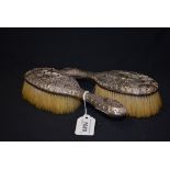 A pair of silver mounted hairbrushes,