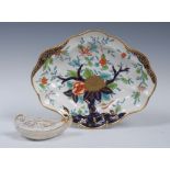 A Coalport shaped oval dish, decorated with a stylised goose, peonies and tree, in cobalt blue,