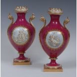 A pair of Coalport pedestal ovoid vases,