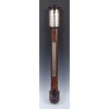 An English Regency flame mahogany and ebony strung stick barometer, silvered 16.
