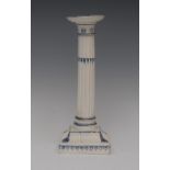 A Wedgwood Pearlware candlestick, dished sconce, fluted column, spreading square fluted base,