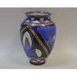 A Carlton Ware Iris pattern ovoid vase, decorated in tones of blue,