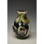 A contemporary Moorcroft Black Swan pattern baluster vase,