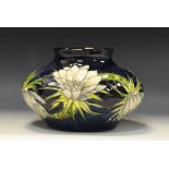 A contemporary Moorcroft Queen of the Night pattern compressed ovoid vase,