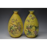 A pair of Shelley ovoid bottle vases,