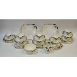 A Shelley Queen Anne shape Green Damson pattern nine-setting tea service,