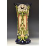 A contemporary Moorcroft Fountains Abbey pattern flared cylindrical vase,