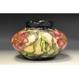 A contemporary Moorcroft Woodstock pattern compressed ovoid vase, designed by Kerry Goodwin,