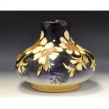 A contemporary Moorcroft Trial compressed ovoid vase,