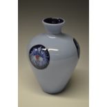 A contemporary Moorcroft Blue Flames pattern ovoid vase,