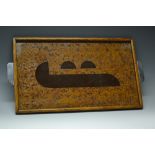 An Art Deco burr wood rectangular serving tray, the field with stylised geometric motifs,
