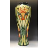 A contemporary Moorcroft Trial Daffodil pattern slender baluster vase, designed by Rachel Bishop,