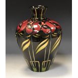 A contemporary Moorcroft Tudor Bud pattern ovoid vase,