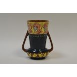 A Foley Intarsio vase, designed by Frederick Rhead,