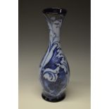 A contemporary Moorcroft Glendair Carp slender baluster vase, tube lined with fish and fronds,