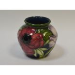 A contemporary Moorcroft Anemone pattern globular vase,