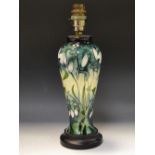 A contemporary Moorcroft Snowdrops pattern slender ovoid table lamp,