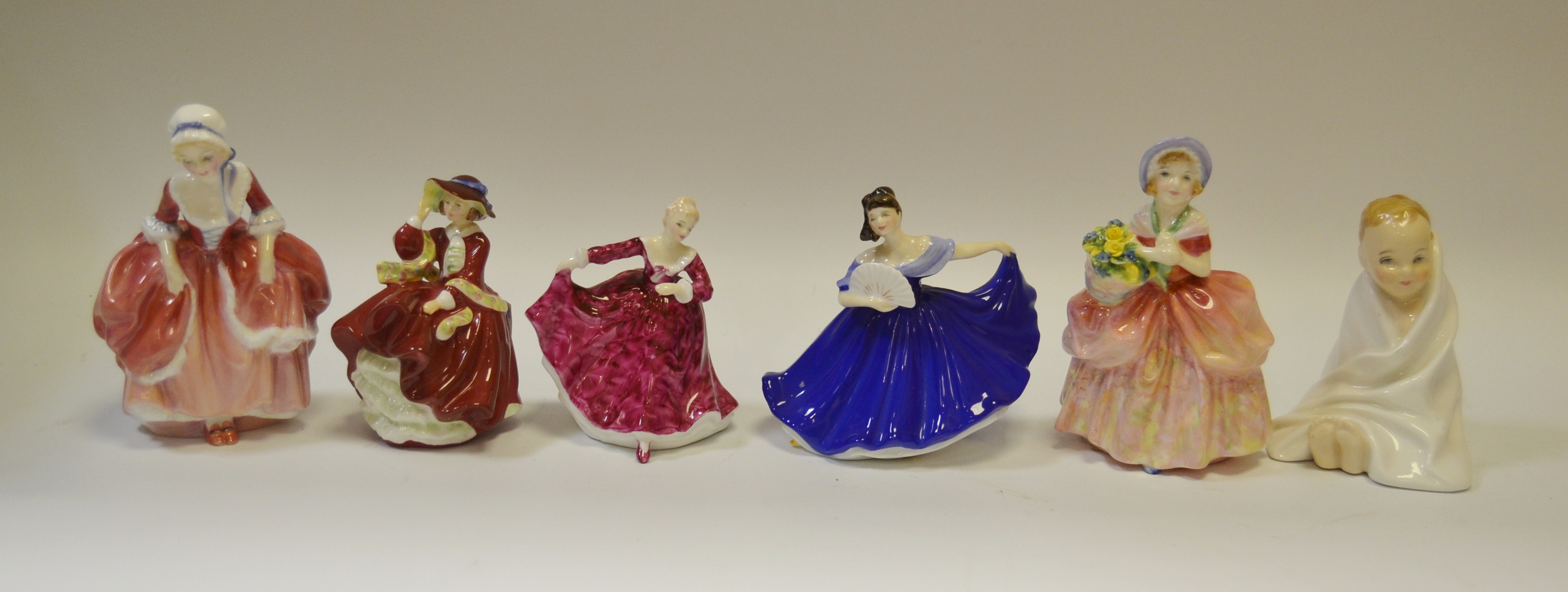 A Royal Doulton figure 'This Little Pig' HN2125; another 'Sissy' HN1809 'Goody Two Shoes' HN2327;