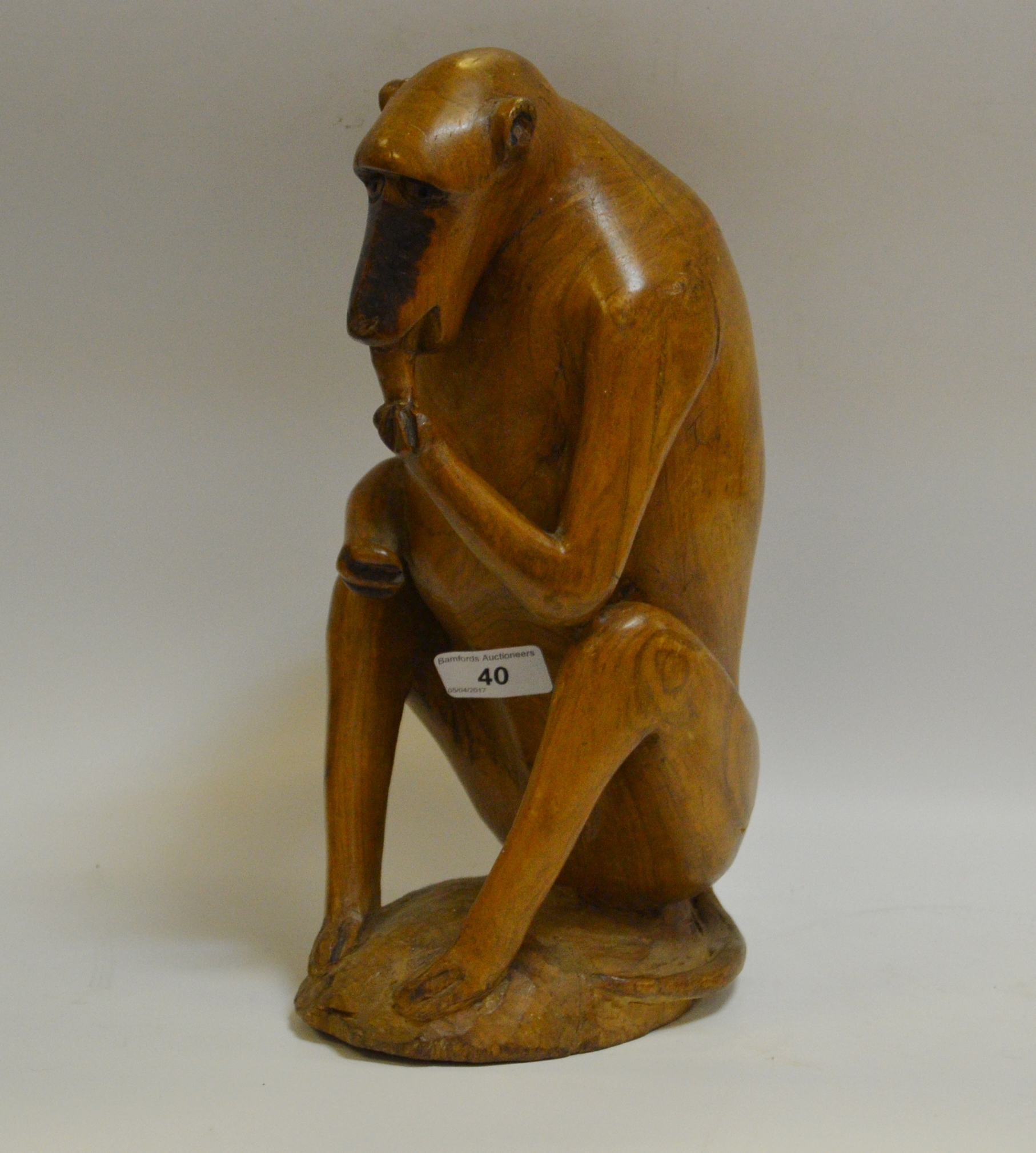 A North African hardwood carving of a Barbary Ape,