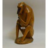 A North African hardwood carving of a Barbary Ape,