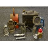 An Esso petrol can; a Railway lantern; Tilley lamps;