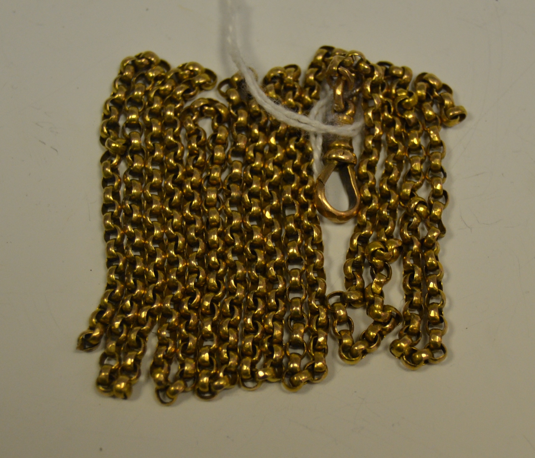 A 9ct gold muff chain, 12.