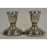 A pair of Elizabeth II silver boudoir candlesticks,