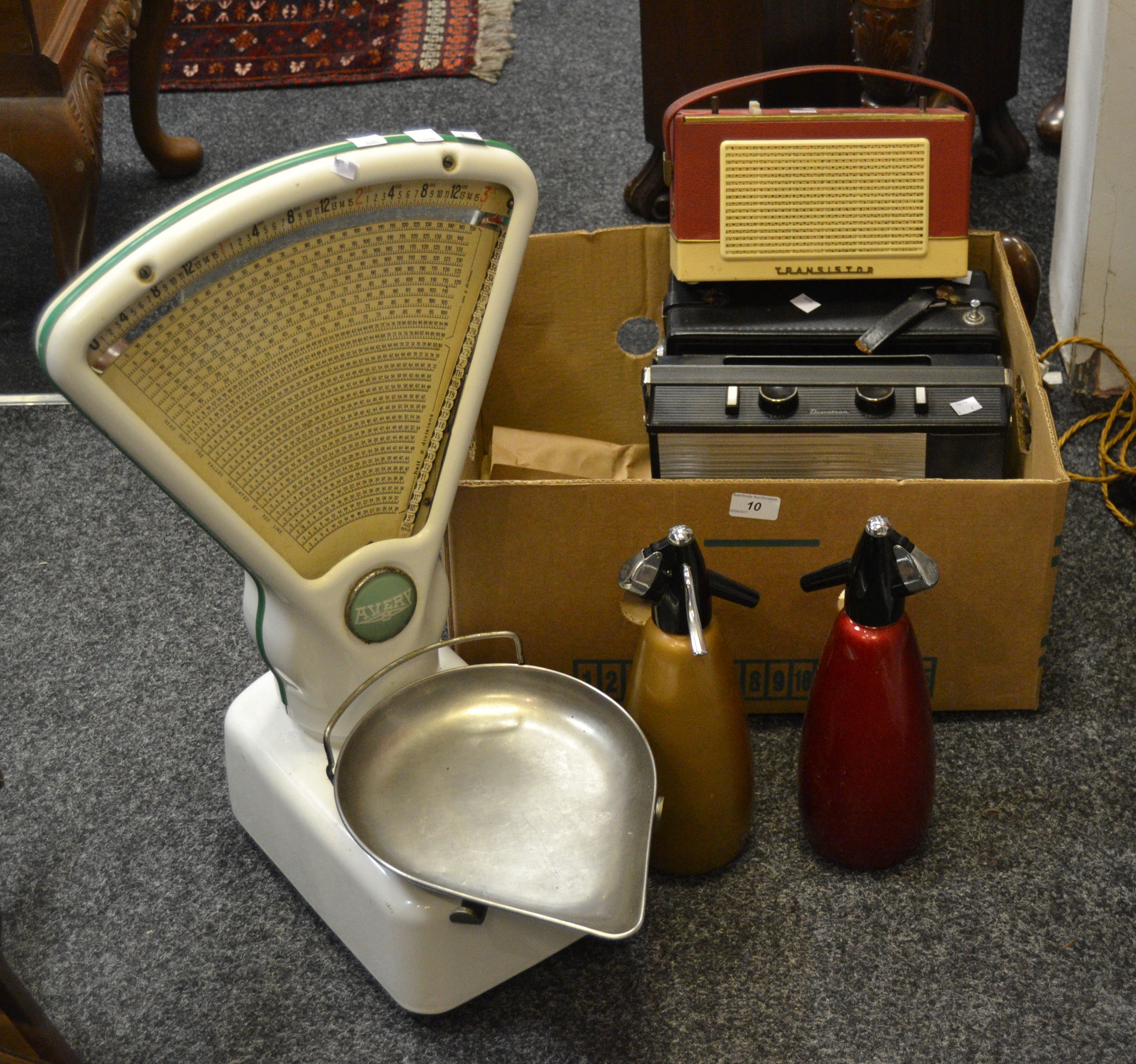 A Pye transistor radio; others Discotran; Philco; others; a soda syphon; another ;