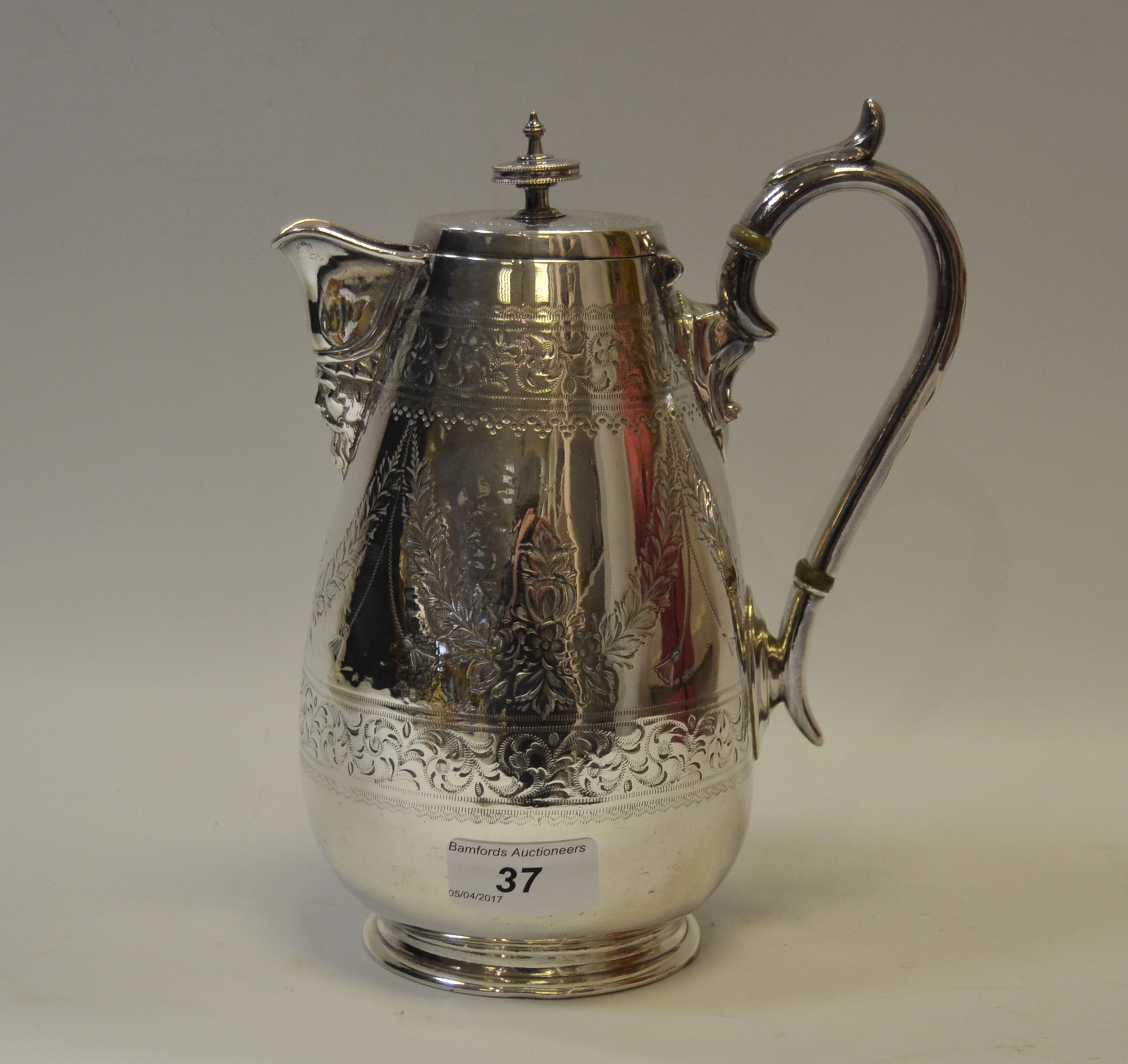 A silver plated teapot