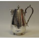 A silver plated teapot