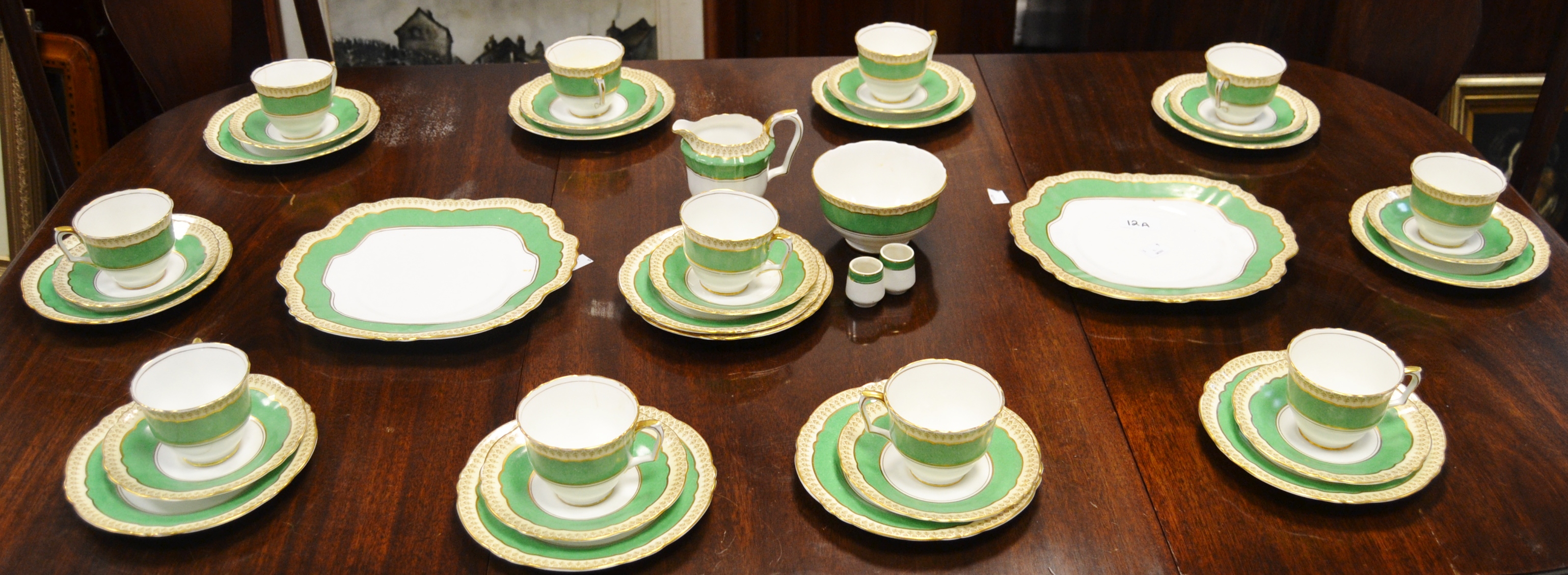 A Victorian Crown Staffordshire part tea service, apple green border ,