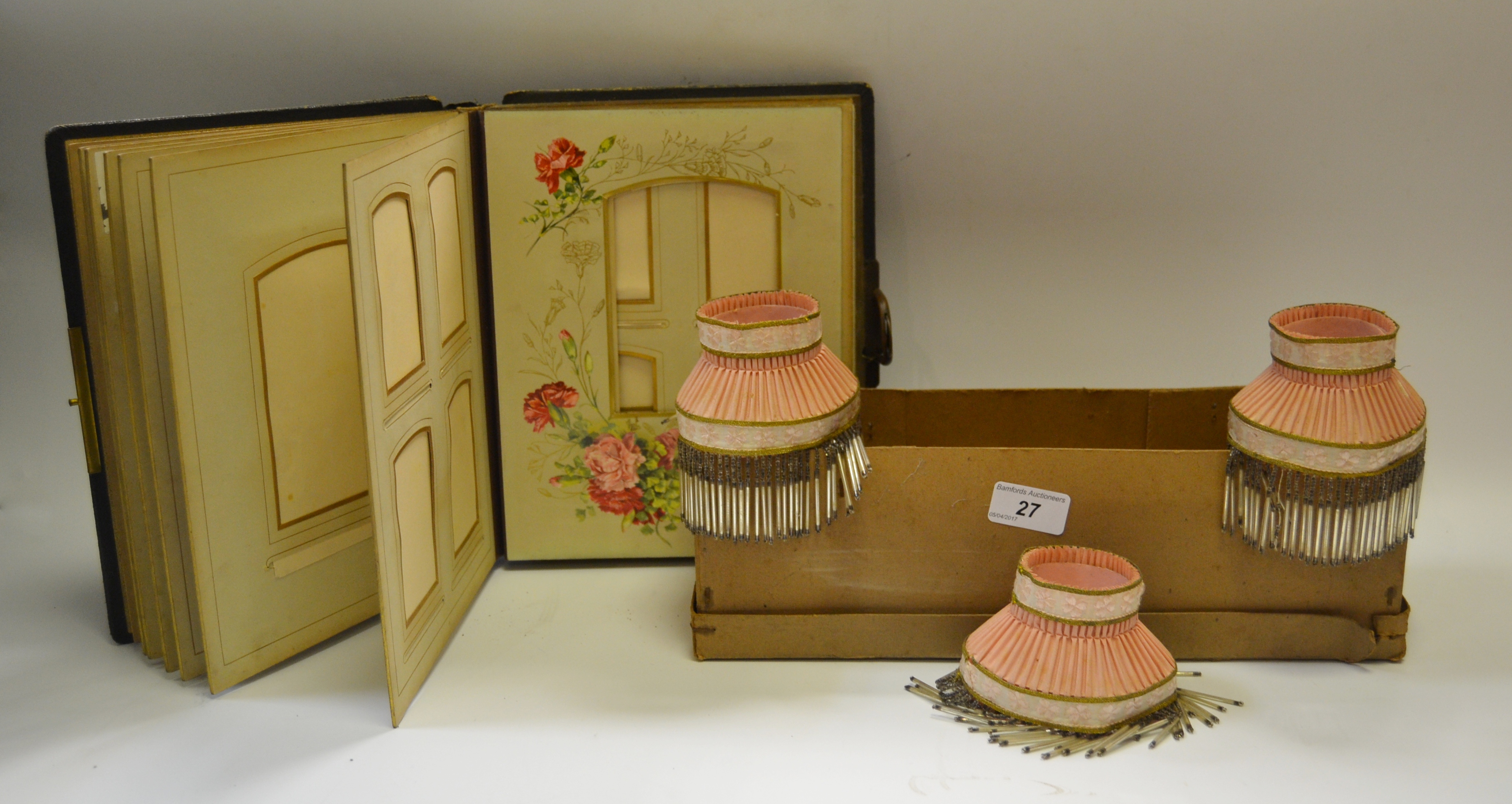 A set of four early 20th century lamp lustre shades, in pleated pink with clover bands,