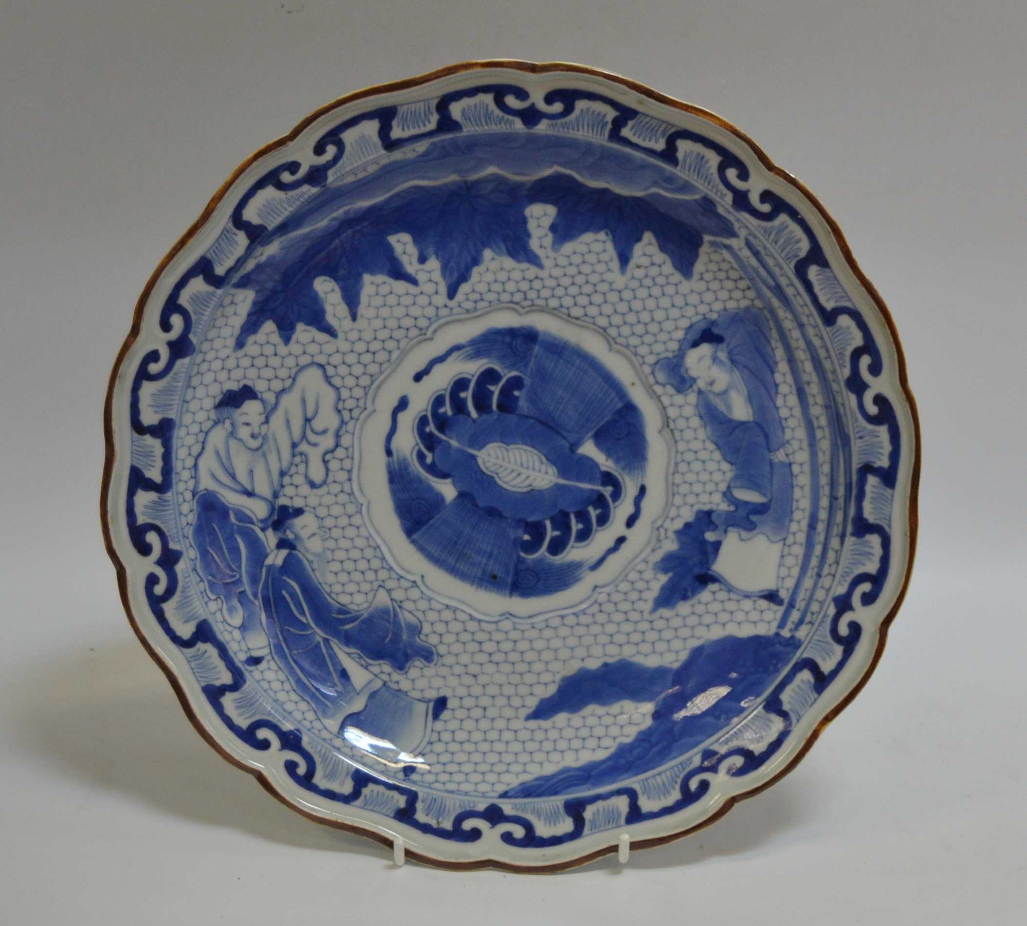 An Oriental blue and white charger,