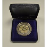 A chrysanthemum society silver medallion