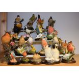 A Country Artists garden bird model, naturalistically modelled, wooden base; others similar, Arden,