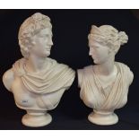 A pair of plaster classical style busts, male and female,