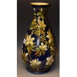 A Doulton Lambeth faience baluster vase,