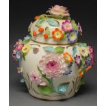 A Coalport Coalbrookdale floral encrusted jar and cover signed G.J.