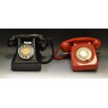 A black bakelite telephone, 332l, FWR 62/2, c.1950; another, red, 746F DFM 79/2, c.