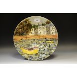 A Cobridge Stoke on Trent stoneware charger, painted with a Quayside scene,
