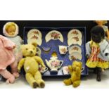 Juvenalia - a Pedigree black baby doll; others; an Amersham boxed Floral design tea set;