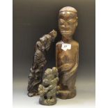 An African hardwood carved figure of a Woman ;