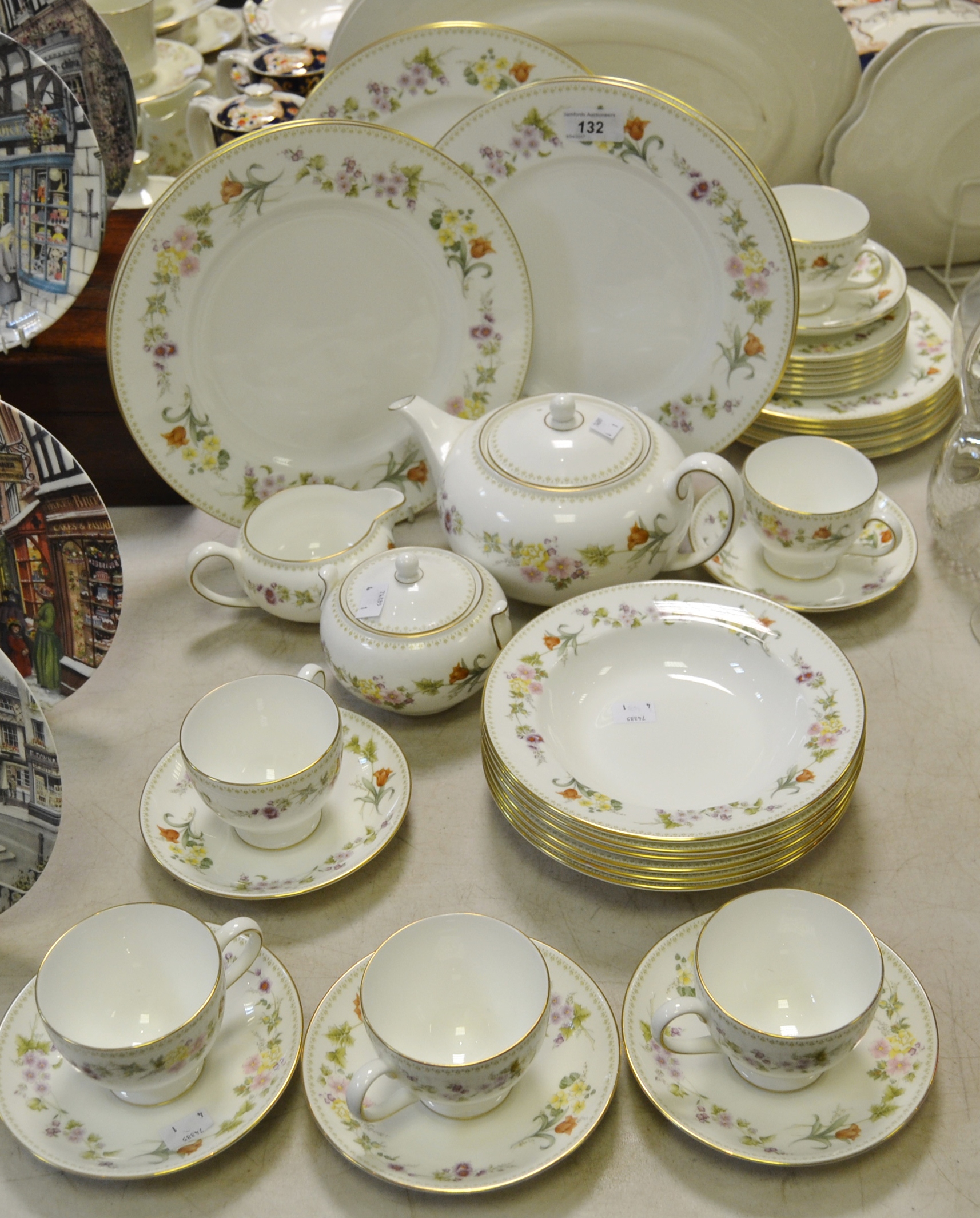 A Wedgewood Mirabelle tea and dinner service for 6 comprising tea pot, milk, sugar, tea cups,